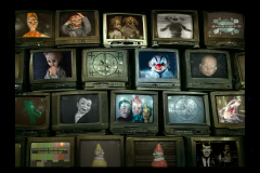 wall of old vintage tube televisions background